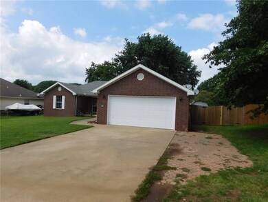 Extra parking on the paver stones, concrete driveway.