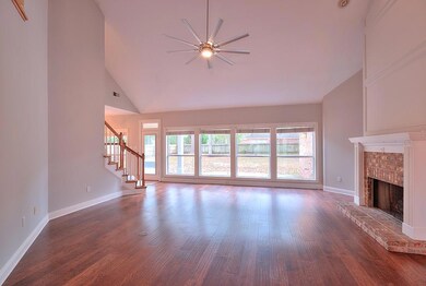 View of Living Room with Gas Fireplace from Dining