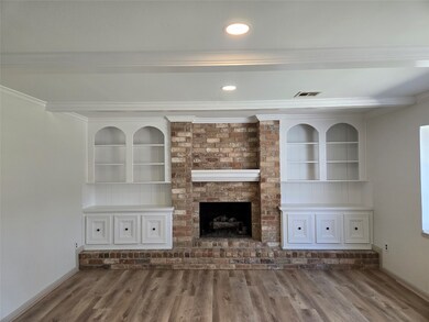 This inviting living room features a central brick