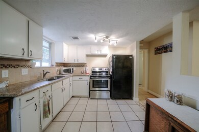 1406 Saddle Rock Dr, Houston, TX 77088 - photo 7