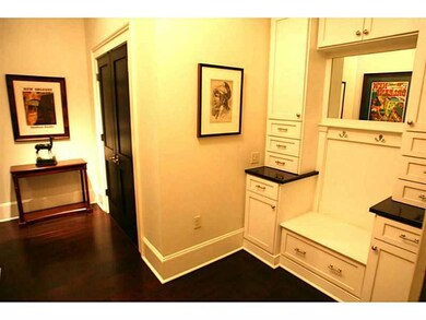 Photo. Large Condo Entry with storage, and a well