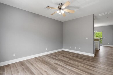Unfurnished room with wood finished floors and a 