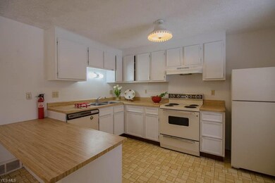 Range, dishwasher and refrigerator are included.
