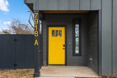 Covered entry with access to the rear yard from ea
