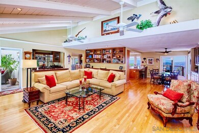 Behind couch, next to slider, is wet bar. Home is 