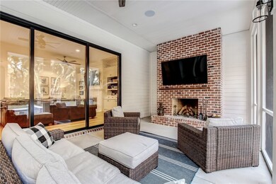 Screened lanai with cozy fireplace