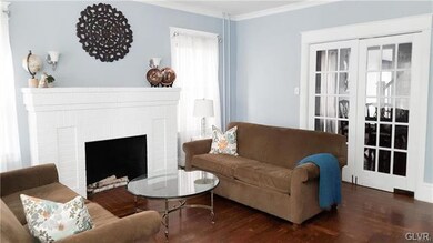 Living Room boasts an original Faux Fireplace for 