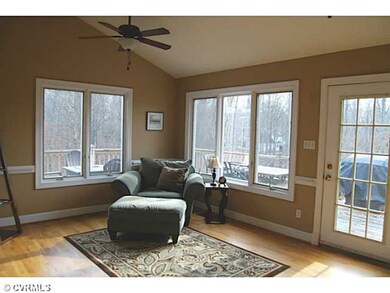Other - Sunroom with vaulted ceiling and hardwood 