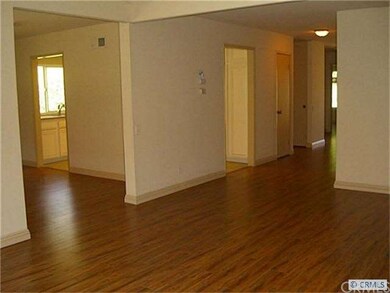Looking towards the hallway with two secondary bed