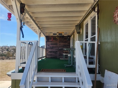 Staircase to the covered deck/patio.