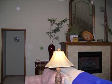 Living Room. Striking marble fireplace.