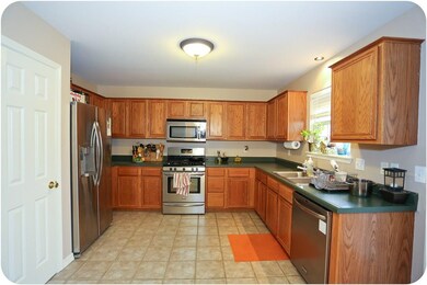 Warm and welcoming with something good on the gas stove, ample storage and counter space.