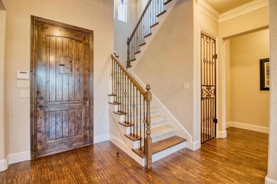 Impeccable hand scraped wood floors greet you!