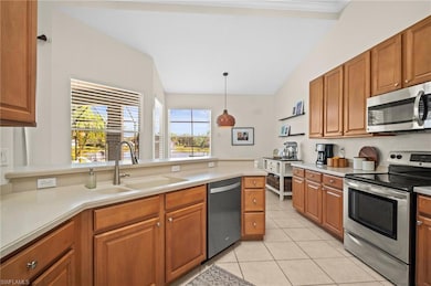 Kitchen featuring appliances with stainless steel 