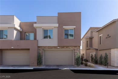 View of front facade featuring stone siding, stucc