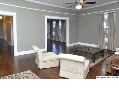 Spacious living room with hardwood floors!