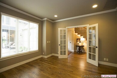 Double French Doors open to the office or flex roo