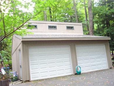 Garage. Garage with stairs to storage loft.