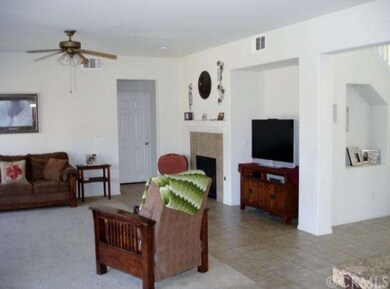 Family room with fireplace, and entertainment nich