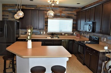 Kitchen with Custom Plank Walls/Back Splash