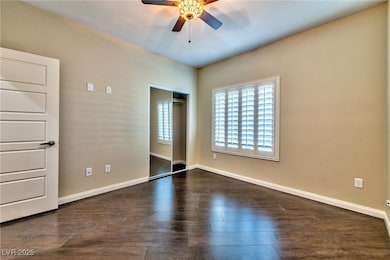 Unfurnished bedroom with a closet, baseboards, a c