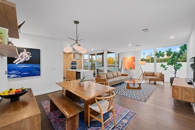 Dining room featuring wood finished floors and re