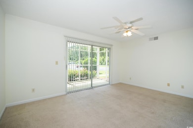 Unfurnished room featuring a ceiling fan, light co