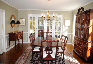 Formal Dining Room Features Wainscoting, Crown Mol