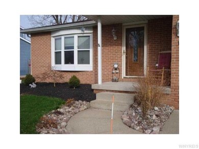 Exterior Front Beautiful professionally landscaped