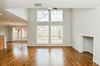 Enjoy the open floor plan and two story wall of wi