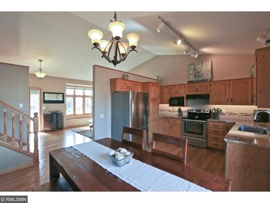 An alternate view of the dining room and kitchen.