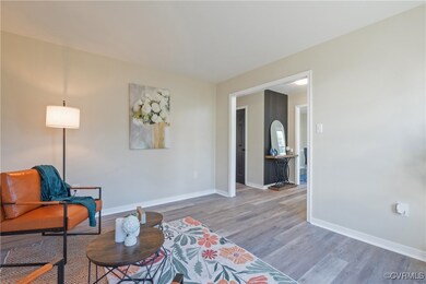 Sitting room featuring hardwood / wood-style floor