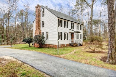 This Williamsburg Colonial Style home features Old