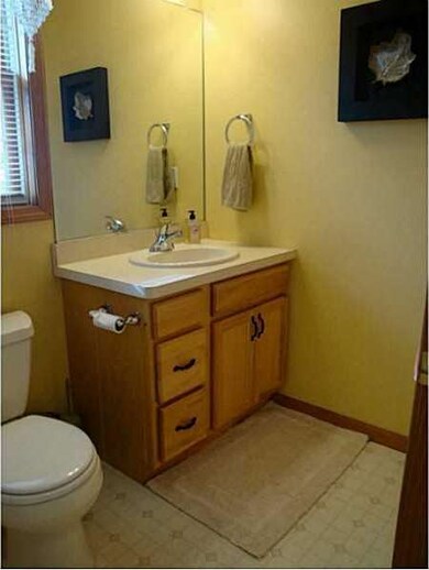 Bathroom. Bright and clean half bath with a window