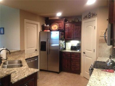 Kitchen. Large corner pantry gives extra storage s