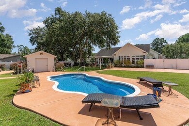View of swimming pool with an outdoor structure, a