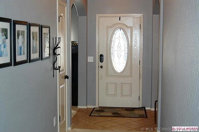 Spacious entry with custom paint.