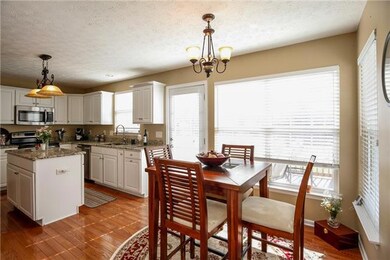 The kitchen is beautifully done and has an eat-in area perfect for your quick family meals.