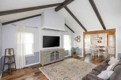 Enjoy an abundance of natural light flooding into the living room through the large windows, accentuating the height of the ceilings. The interplay of light and shadows creates a captivating atmosphere, perfect for relaxation and rejuvenation.