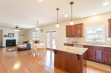 The kitchen, informal dining and family room inclu
