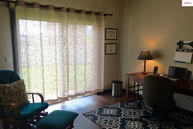 One Bedroom Has Glass Doors Out To A Patio