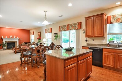 Opposite view of the eat-in kitchen.  Slider door 