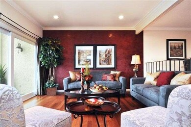 Spacious Living Room features cherry hardwood floo