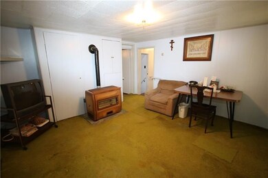 Gas Space Heater in Living Room w/ Built-in Storag