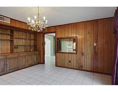 Dining Room. Notice a wall of Built in storage