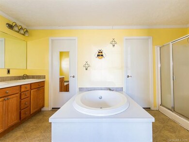 Master bath with dual vanity, garden tub, shower, 