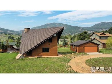 Maintenance-free siding, professionally planted and well-established lawn, two car detached garage.