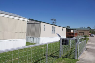 Mobile homes to left of property