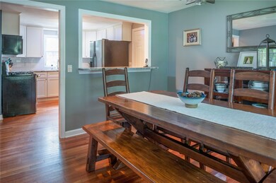 THE OPEN WALL TO THE AMPLE DINING ROOM REALLY CONT