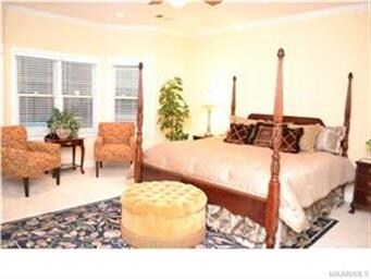 Double doors open to the spacious, downstairs mast